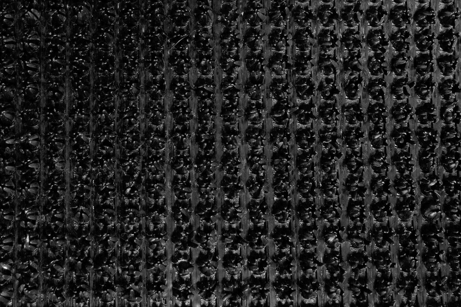 Mustritud must seinetapeet detailne vaade lähedalt.