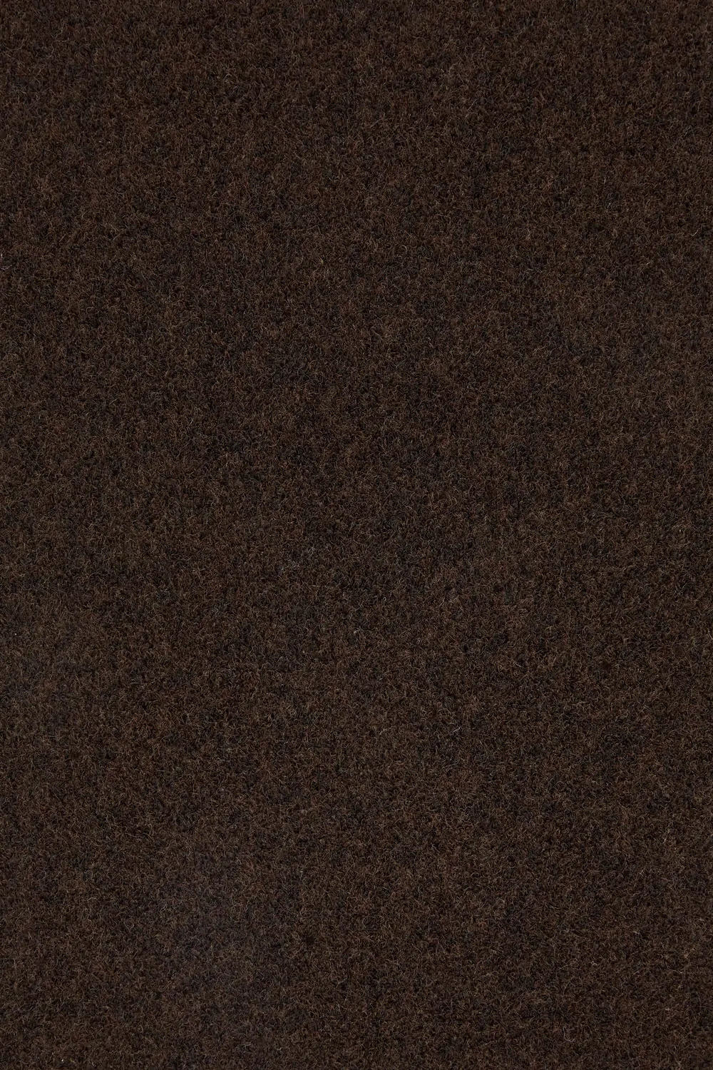 Pruun villakangas lähedalt mustriga tekstuuriga pind