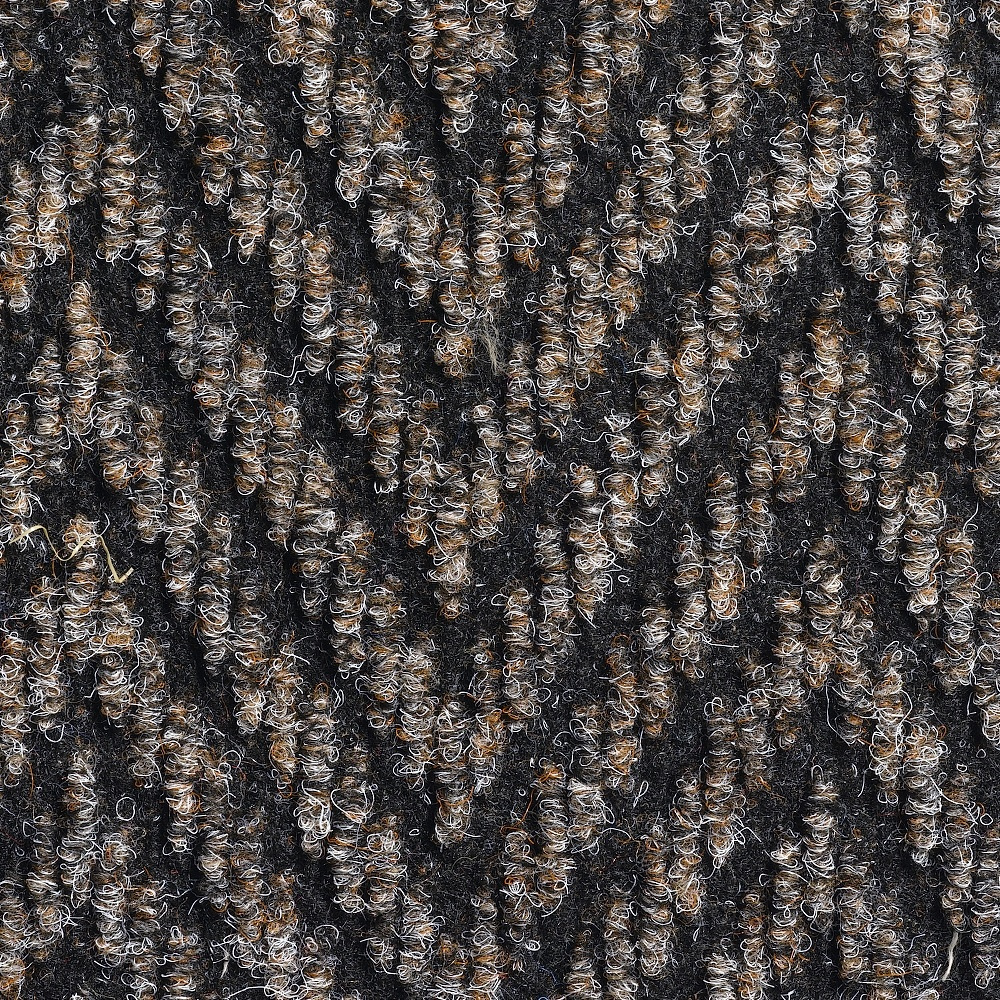 Hallvaip mustriga tekstuur lähedalt vaadatuna.