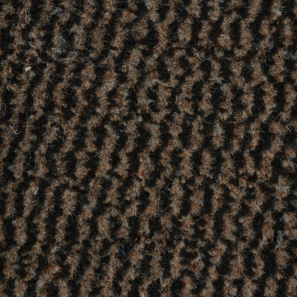 Pruun ja must mustriline vaip lähedaltvaates