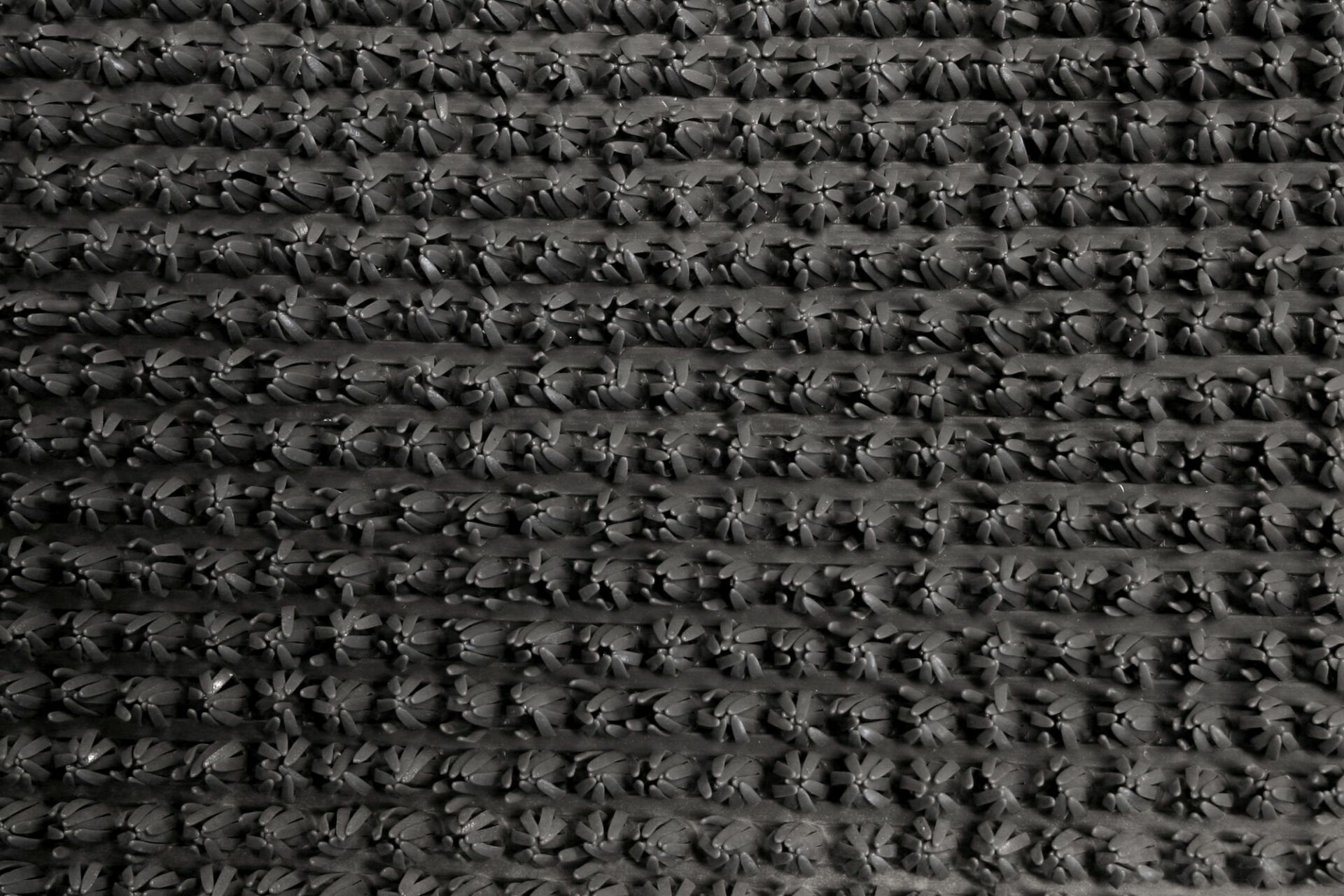 Tume tekstiil tekstuuriga punane vaip lähivõte