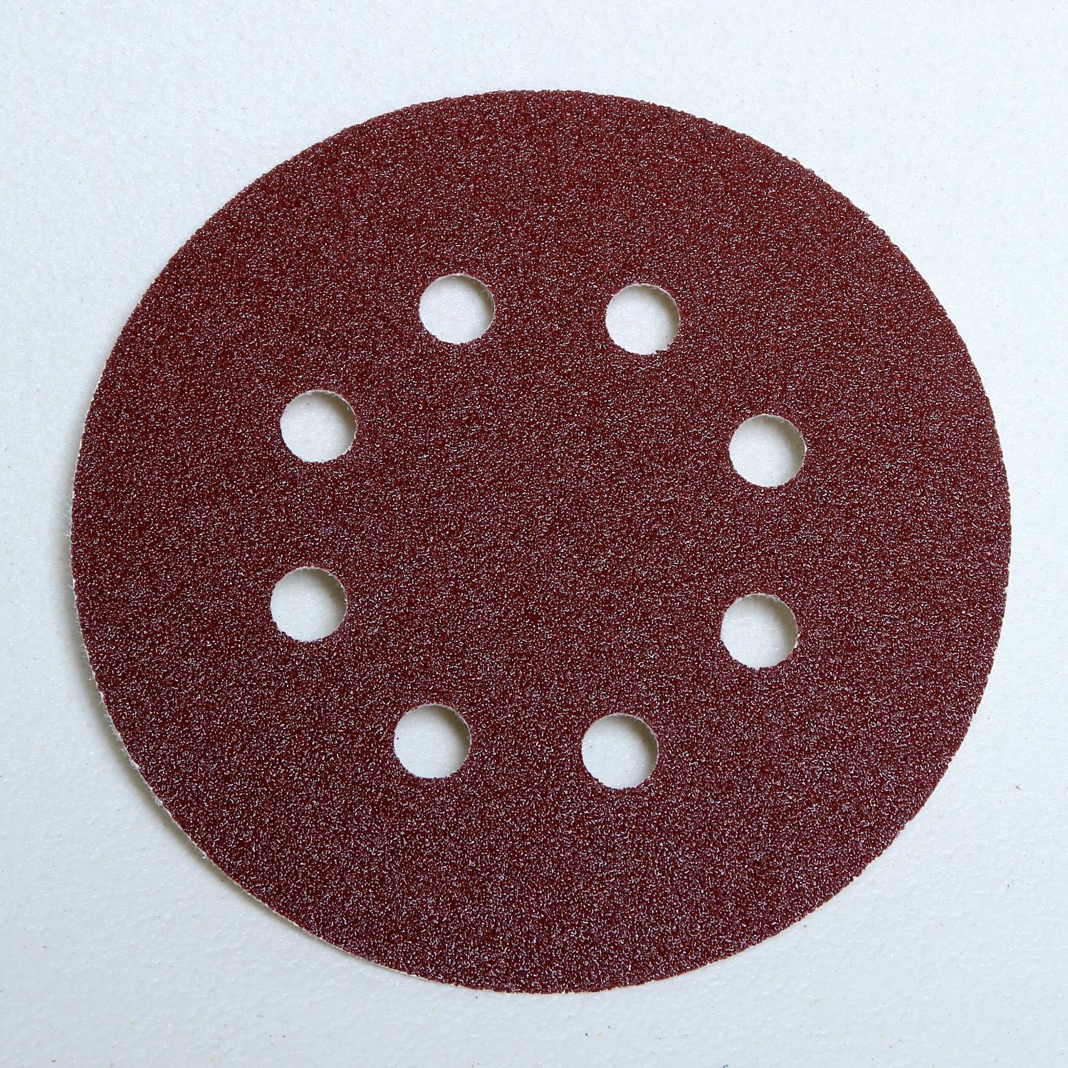 Ümmargune liivapaber kaheksa auguga puidutööks