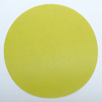 Kollane ümmargune punktimustriga tapeetplaat.