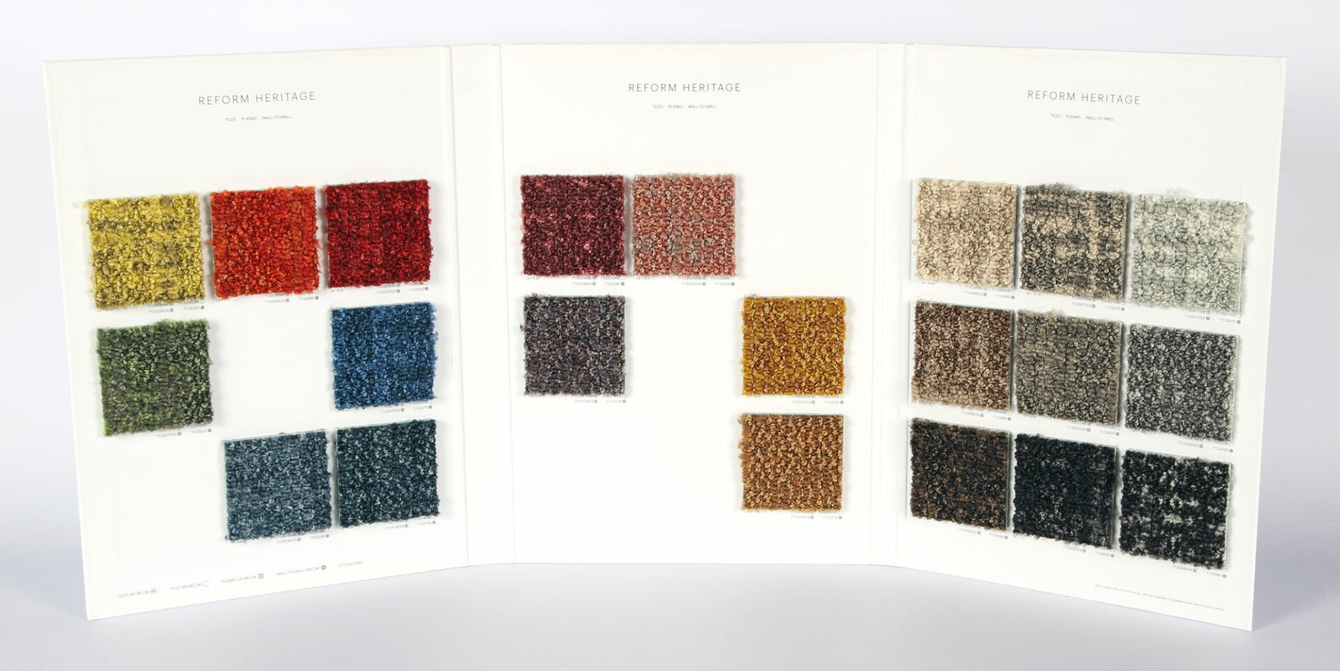 Värvilised kangastestid valgel taustal näidisena