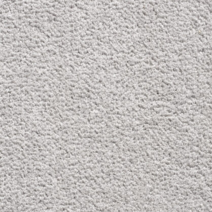 Helesinine pehme tekstuuriga vaip kodu sisekujunduses