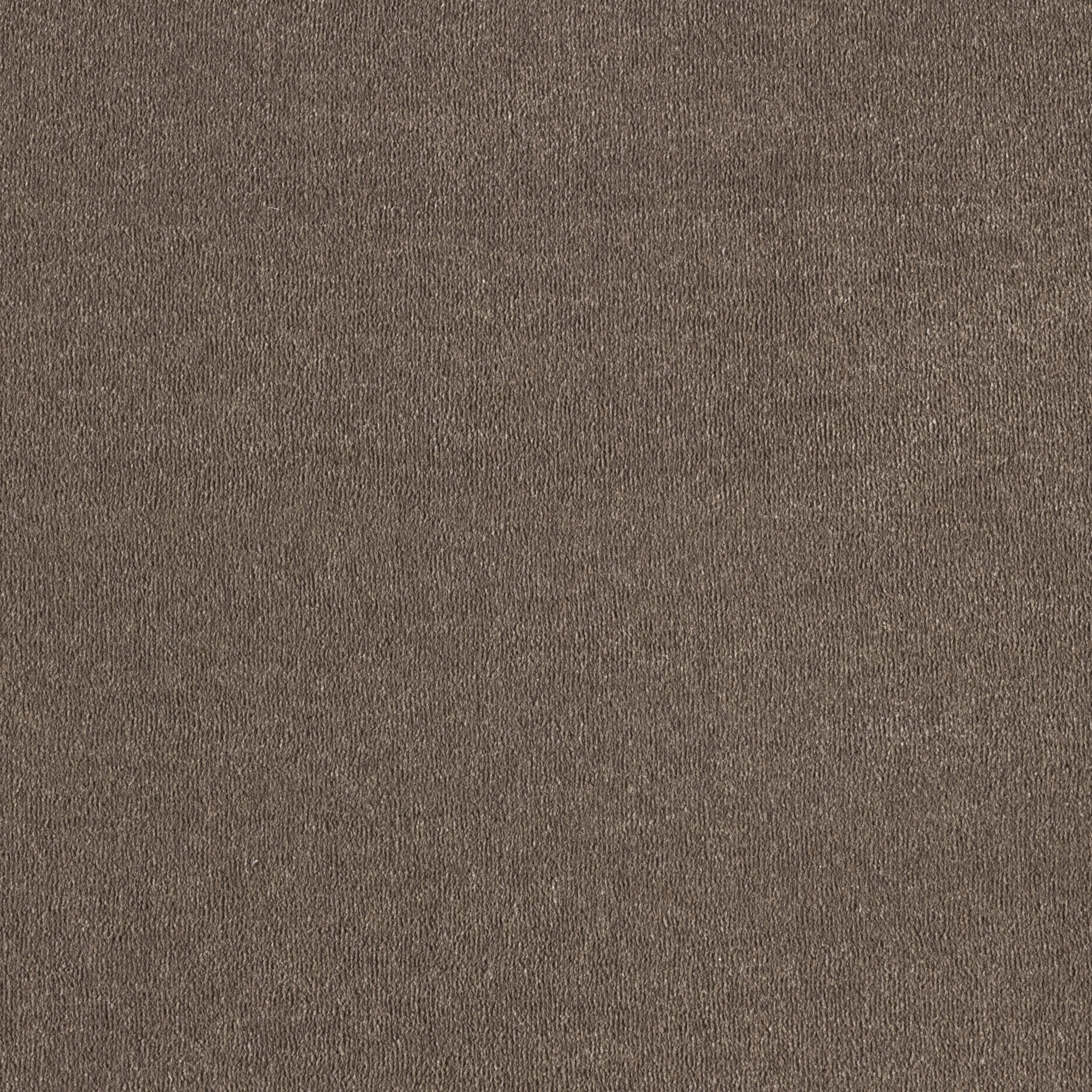 Pruun vaip tekstuuriga mugav sisekujunduseks