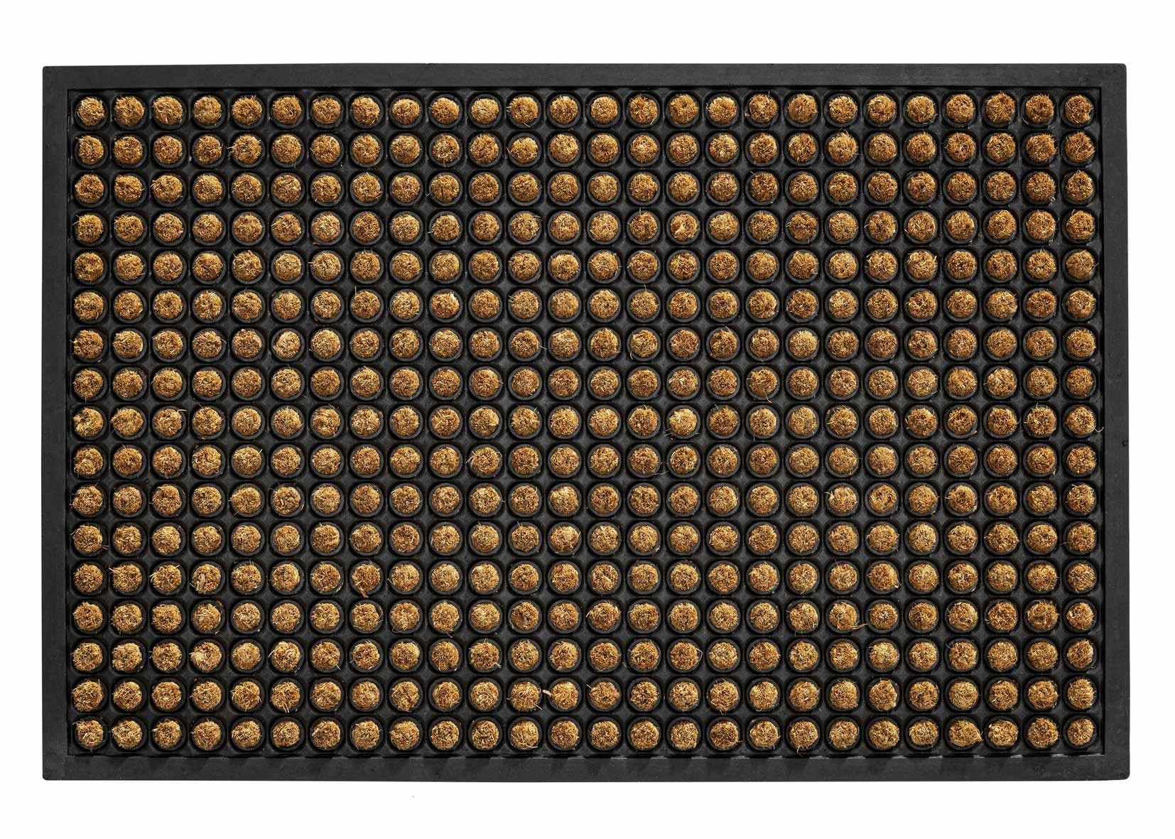 Pruun uksematt kreemja mustriga mustal taustal