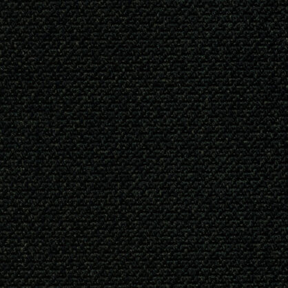 Tume mustri tekstuuriga kangas lähivaates Eestis