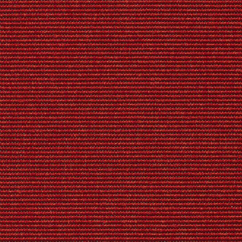 Punase ja mustaga triibuline kangamuster lähedalt.