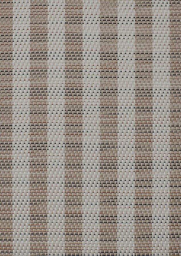 Kootud kangas beeži ja pruuni mustriga.