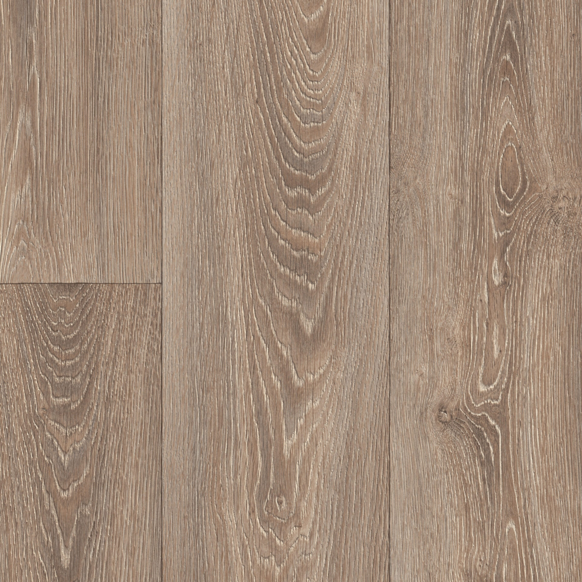 Puitpõrandate naturaalne muster pruunides toonides.