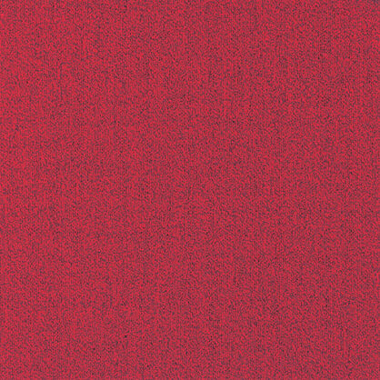 Punane tekstuuriga pind lähedalt vaadatuna.