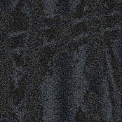 Tume mustriline tekstiilmaterjal lähedalt vaadatud tekstuur