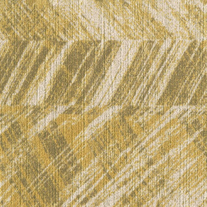 Kollane ja beež tekstiil tekstuuriga muster lähedalt vaadatuna