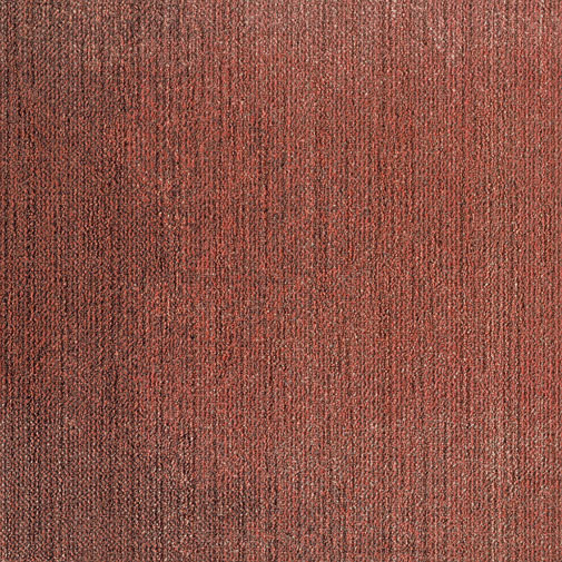 Punase tekstuuriga vaipläti lähedalt vaade.