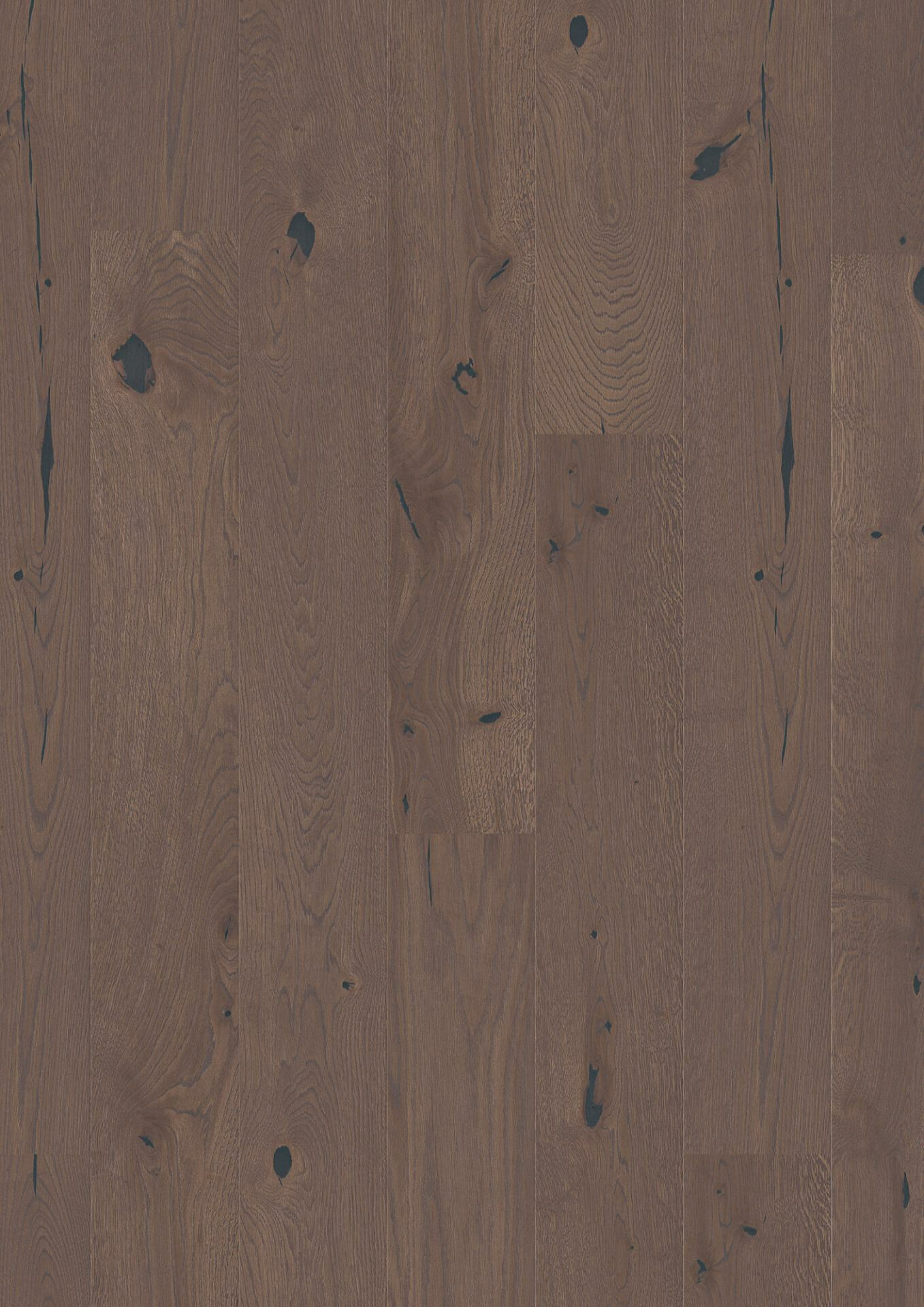 Pruun parkettpõrand puidust mustriga lähedalt.