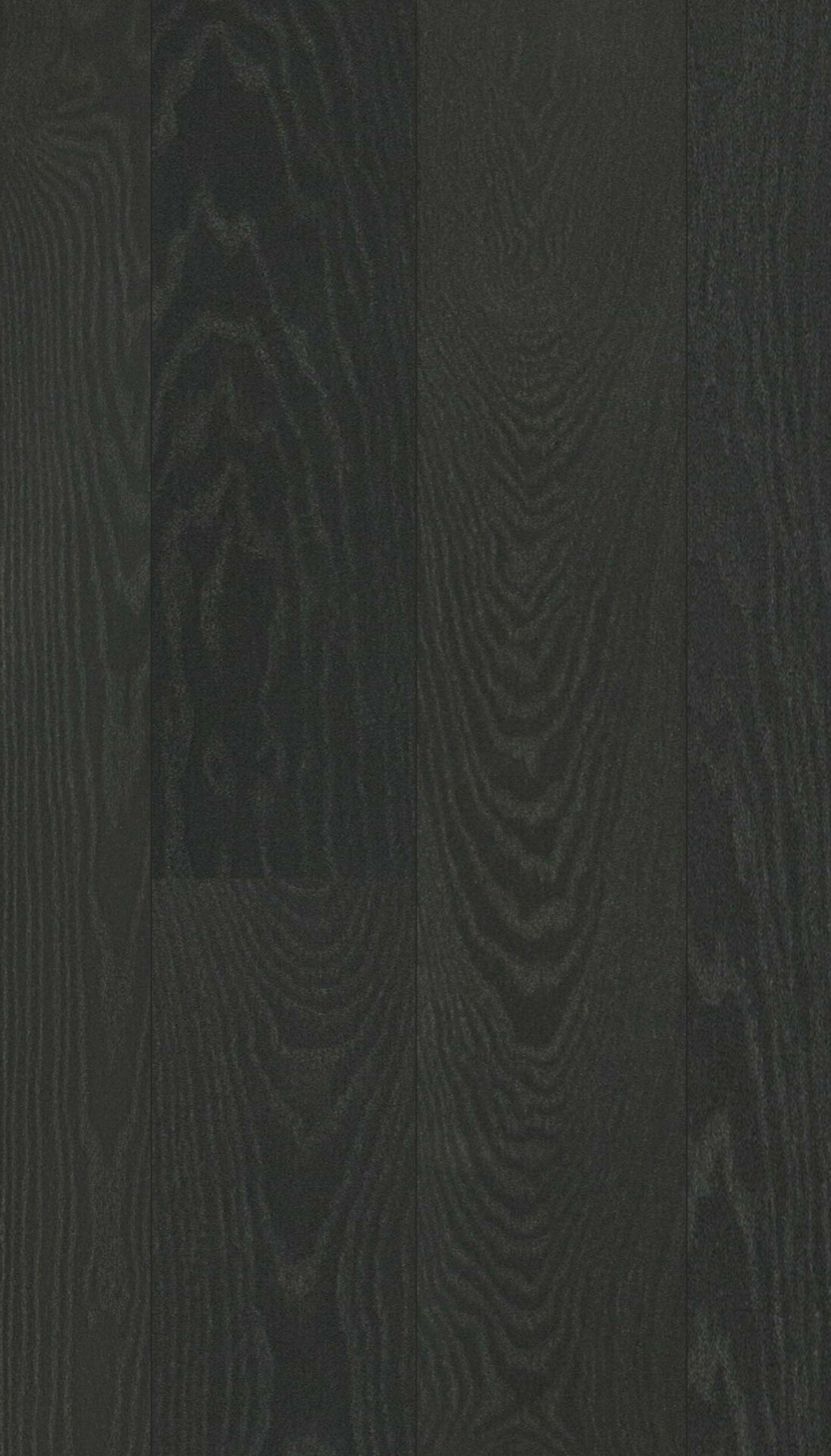 Tume puitparkett musta puidu mustriga.