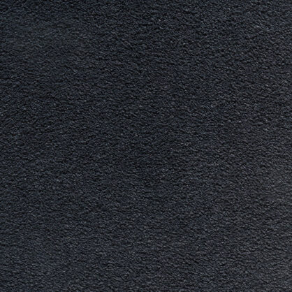 Tumemustriline tekstuur musta taustaga lähedalt vaade