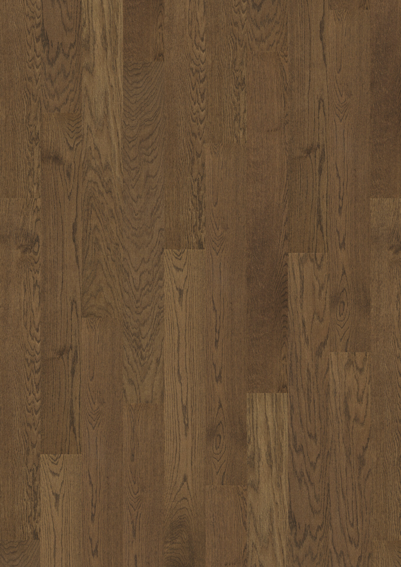 Puidust parkettpõrand pruunika tooniga muster.