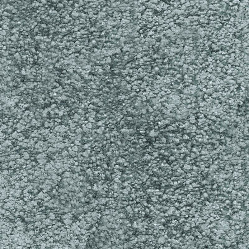 Sinine vaip tekstuuriga kodu sisekujunduses.