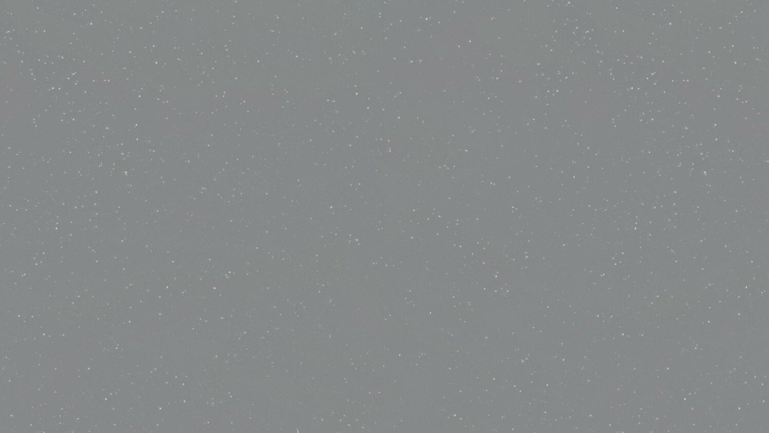 Hall lähedalt vaadatuna abstraktsete mustritega taust.