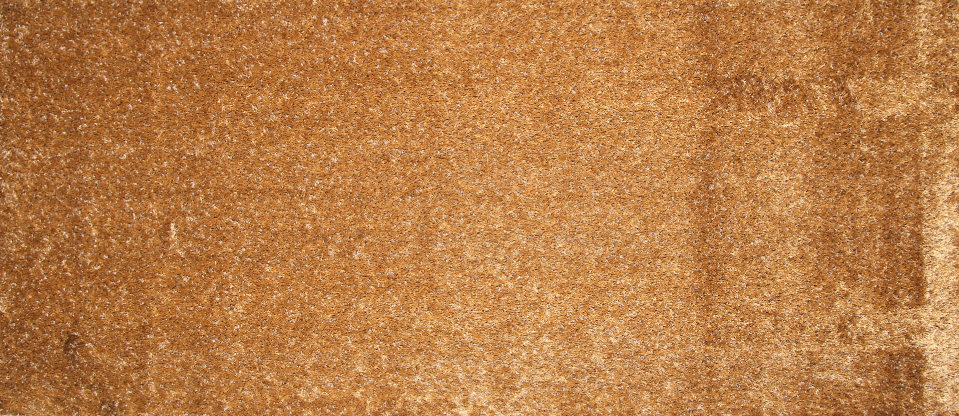 Pruun tekstuuriga vaip lähedalt vaadatuna