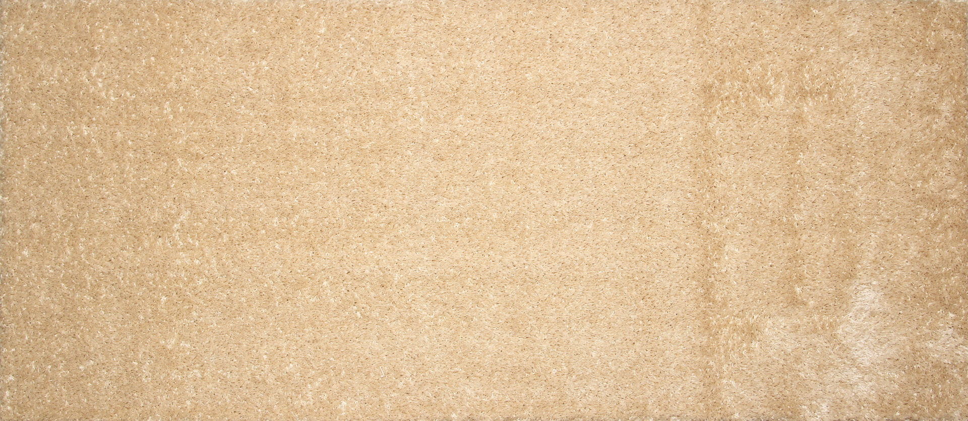 Kulunud hele vaip põrandakatte tekstuuriga.