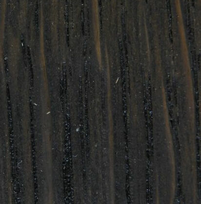 Tumeda puidust tekstuur lähedalt vaadatuna Eestis