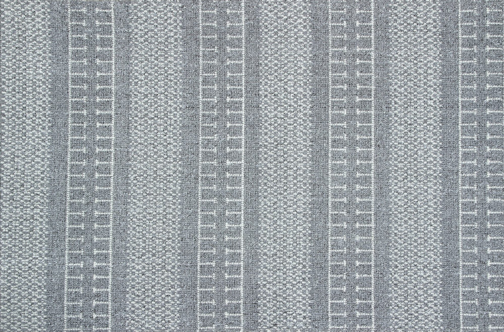 Hallitriibuline mustriline kangas dekoratiivseks kasutuseks