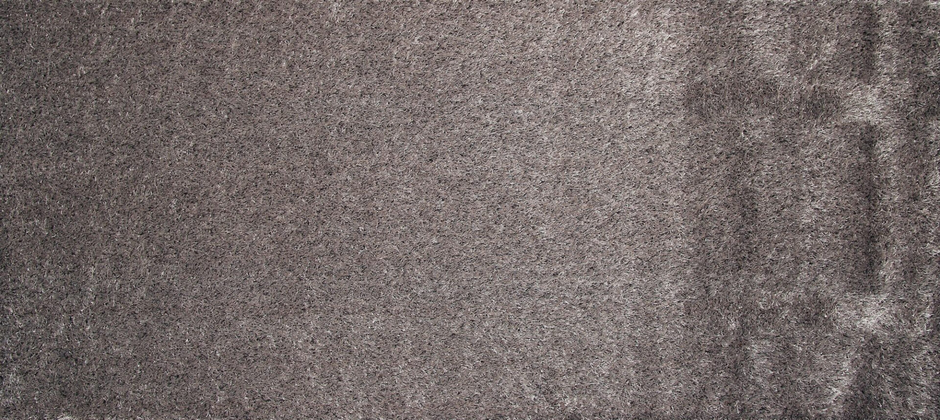 Tume pinnatekstuur diagonaalsete triipudega muster