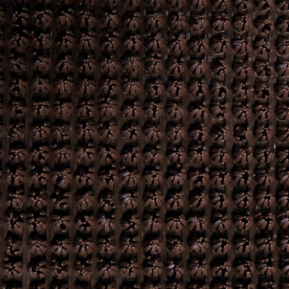 Tume tekstuuriga kootud kangas muster detailne ja autentne