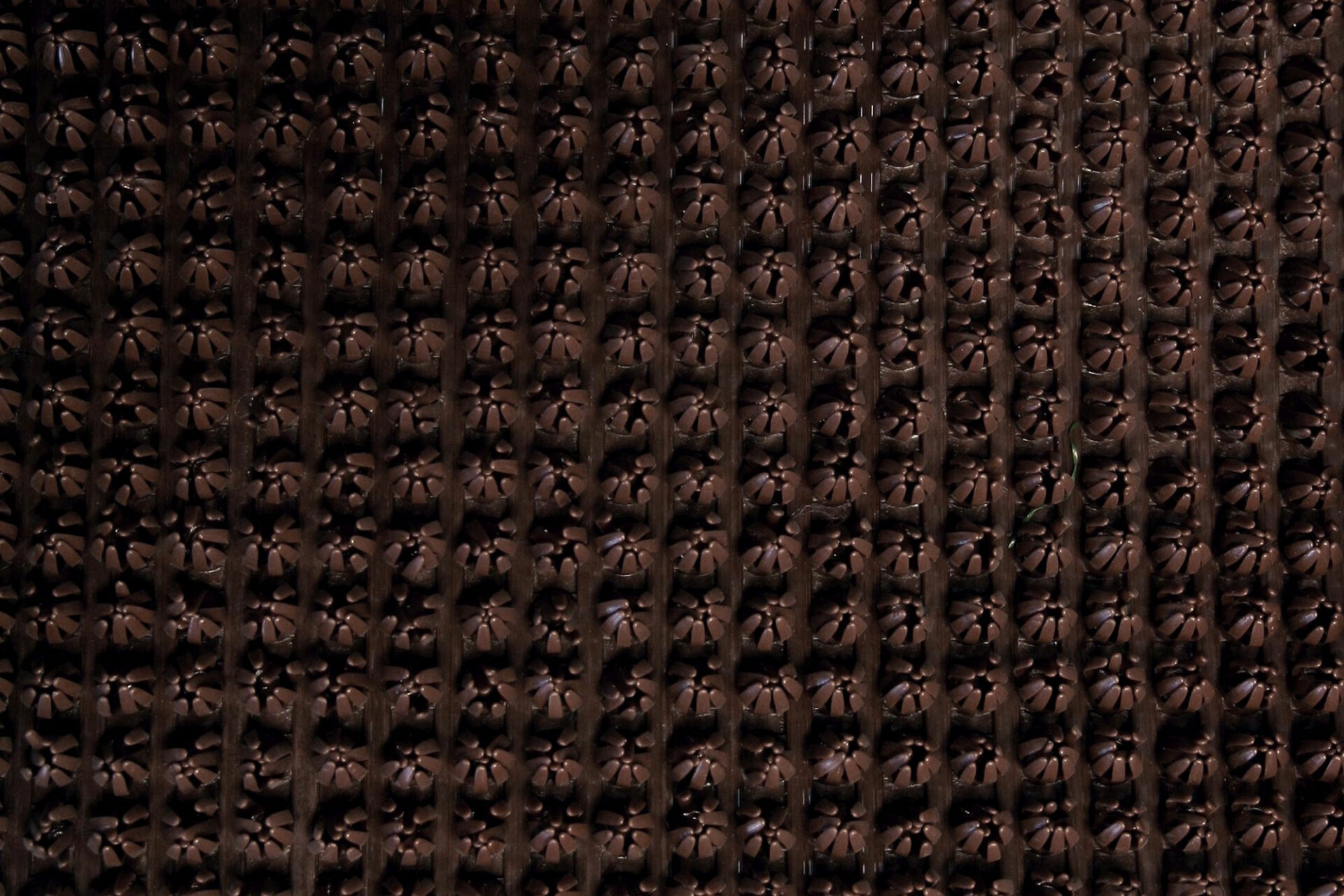 Tume tekstuuriga kootud kangas muster detailne ja autentne